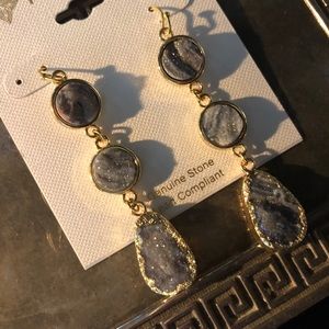 Get stone dangly earrings